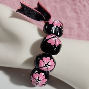 Hawaiian Hand-Painted Black Kukui Nut Bracelet with Pink Hibiscus Flowers
